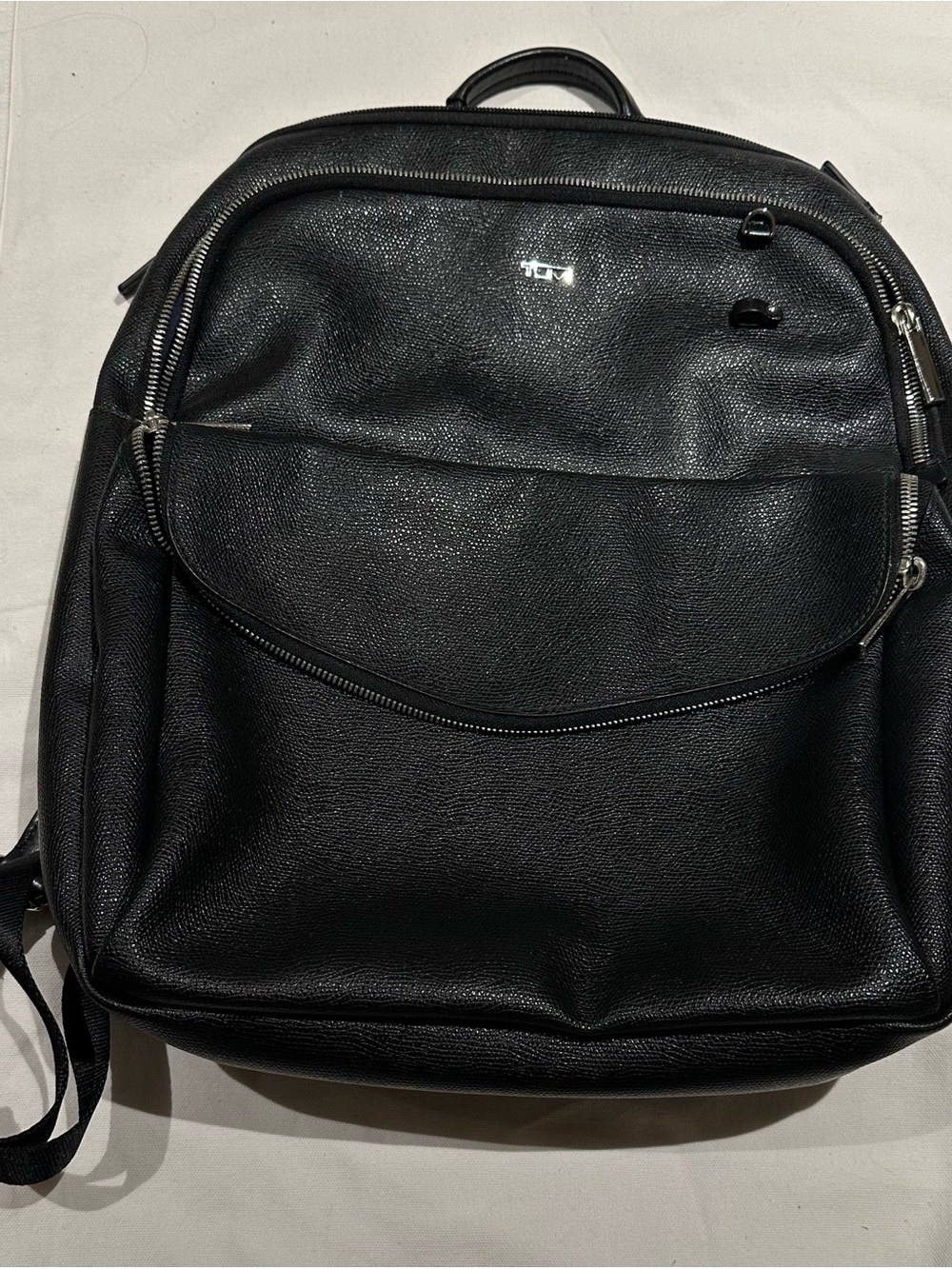 Tumi Black Leather Backpack with Front Zip Pocket